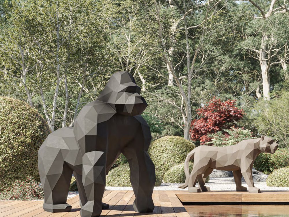 Sculptural outdoor decor pieces beside a pool